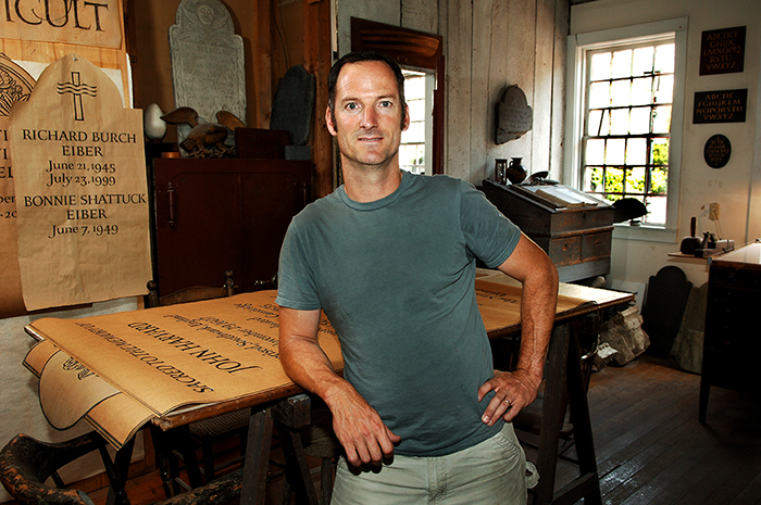 Nick Benson, a third-generation stone carver and letterer, is the owner and creative director of The John Stevens Shop in Newport, Rhode Island. Photo by Tom Pich